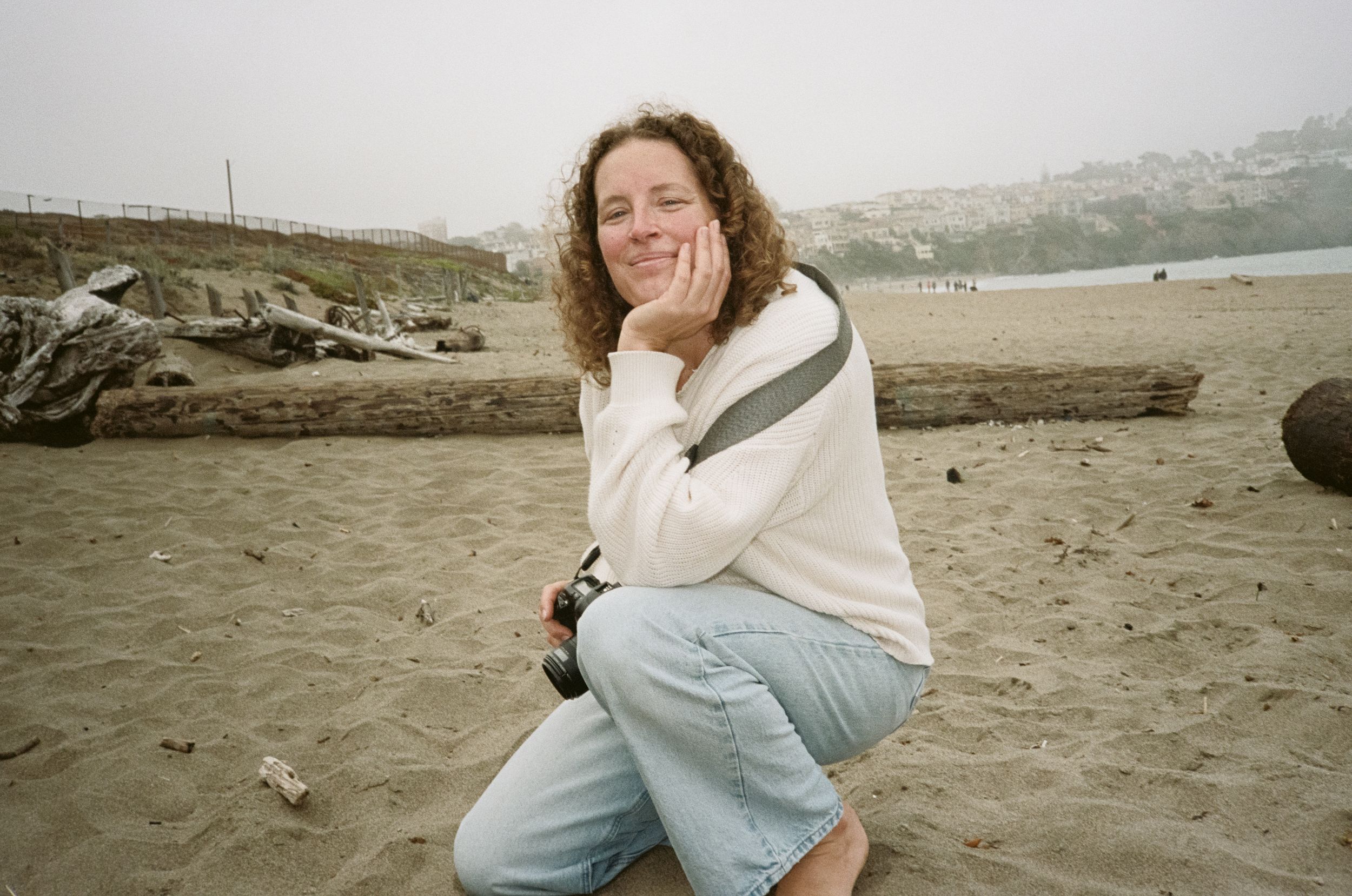 Cass Jens, photographer at Marin Mini Sessions, at the beach with her camera