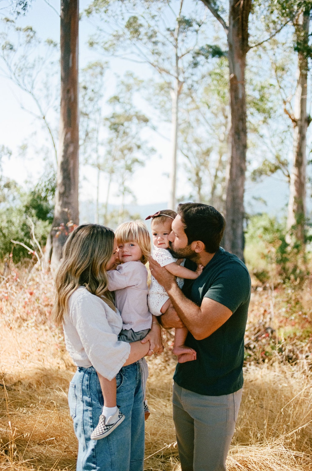 Mother laughing with her toddler during a genuine, unposed moment