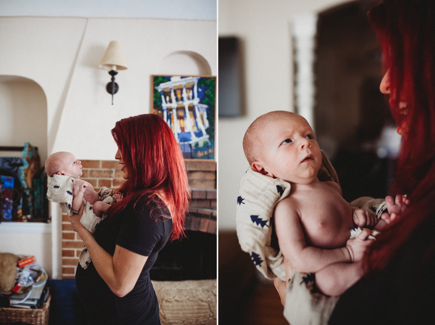 Mom holds her newborn face to face by the fireplace