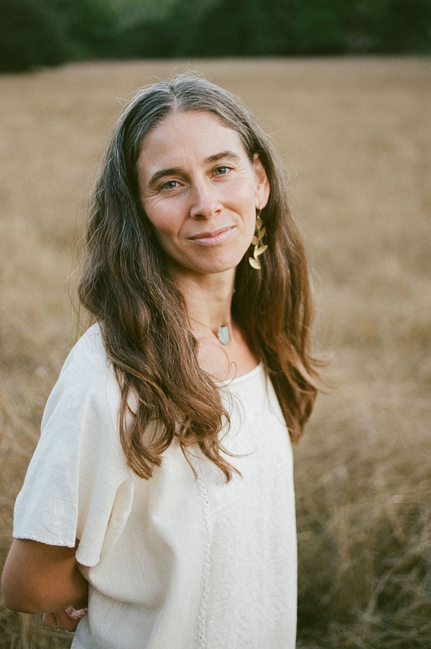 Natural outdoor headshot in golden field — headshot photography in Marin County and San Francisco