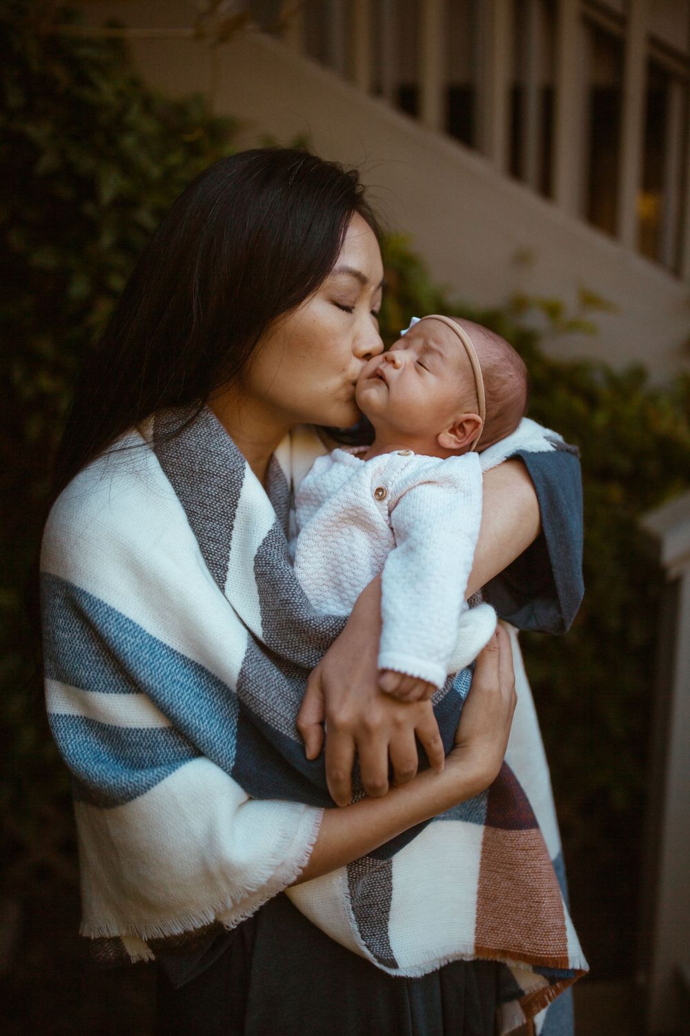 Gentle moments between parent and baby wrapped in white — San Anselmo Newborn Photographer