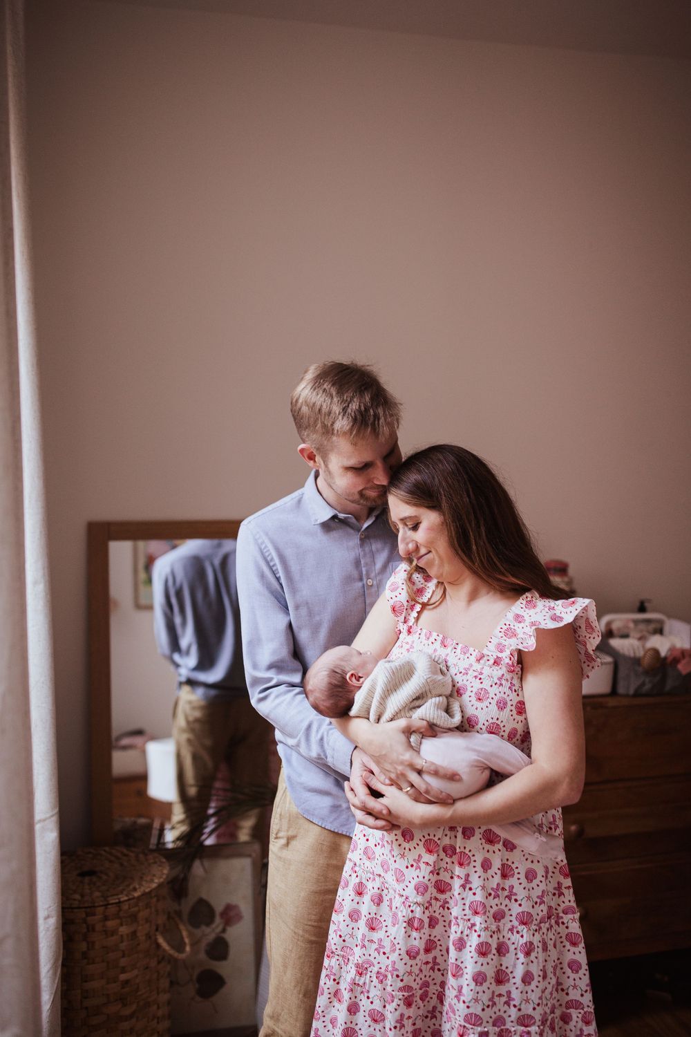 New parents tenderly gazing at their newborn baby — San Anselmo Newborn Photographer