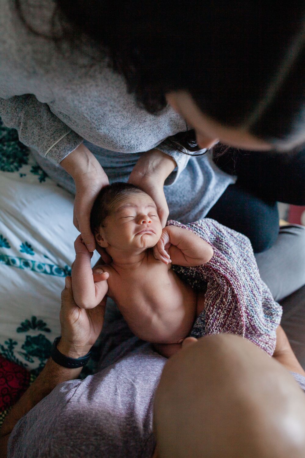 Tender moments between family members during a newborn session — San Anselmo Newborn Photographer